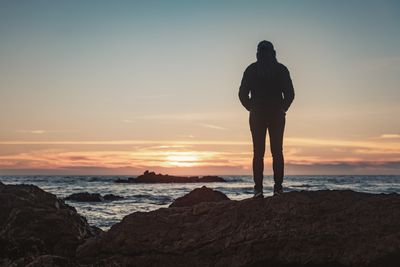 woman watching the sunrise